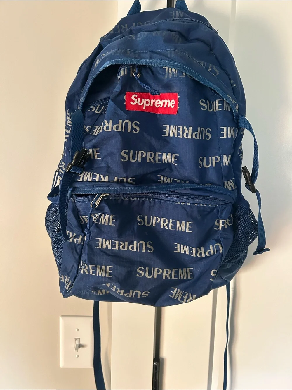 Supreme Navy All-Over Logo Backpack with Red Patch